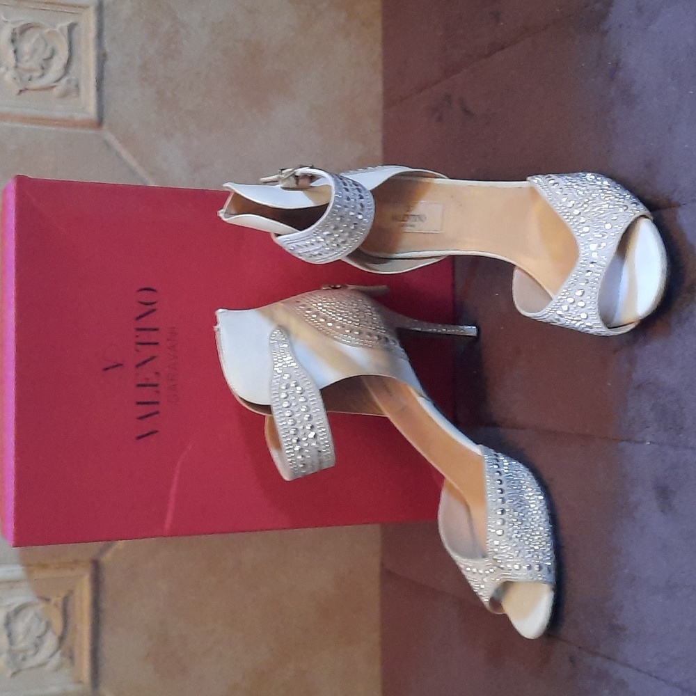 Studded white heels by Valentino